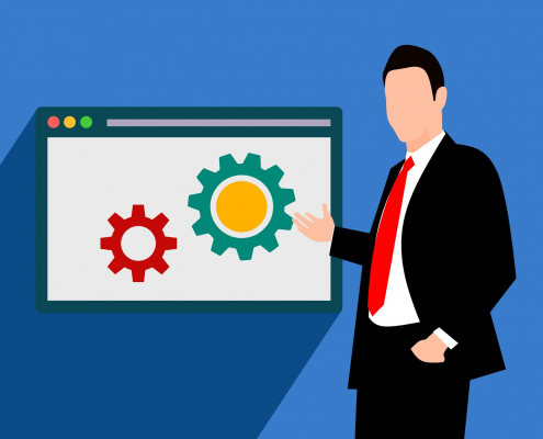 Grafik: Schaubild Mann zeigt auf Tafel mit Zahnrädern